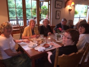 Smiles after an enjoyable meal and pleasent company
